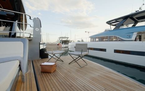 Sunreef Ultima 88 aft Ocean Lounge with freestanding deck furniture