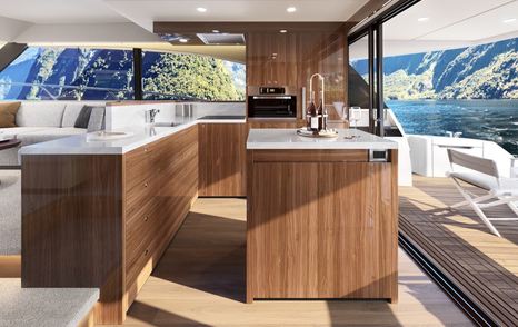 Maritimo M50 galley interior with central island, aft cockpit access and panoramic side windows