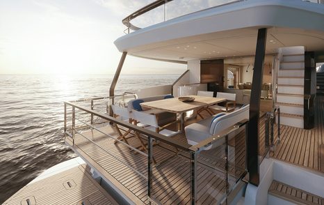 Aft view of Azimut Grande 26 Metri, exterior seating area on aft main deck, overlooking the stern.