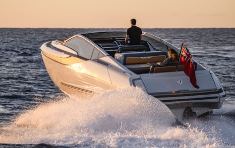 Sportsboat Fairline F33 running shot at sunset