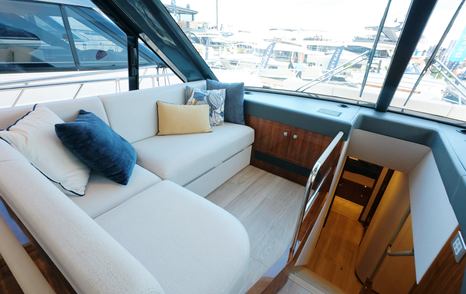 Riviera 5600 Sport Platinum Edition companion lounge beside the helm