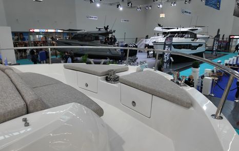 Greenline 42 foredeck bench seating with mooring cleats and storage lockers