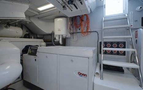 Nordhavn 75 EYF engine room with twin Onan generators, electrical systems and service equipment