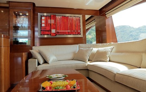 Superyacht Harmony III's interior L-shaped sofa