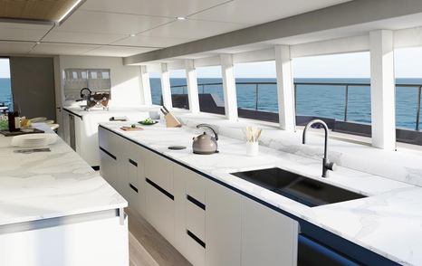 Two Oceans 870 Power Catamaran galley with white counters and cupboards