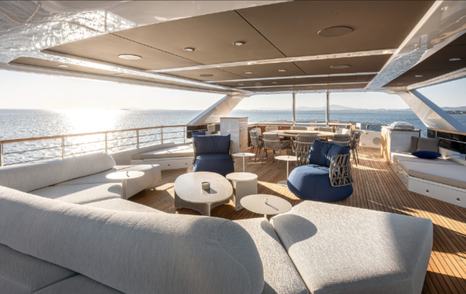 Numarine 40MXP explorer yacht upper deck with shaded alfresco dining and seating