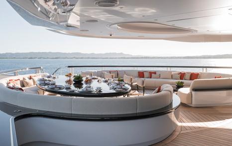 Superyacht Ahpo aft deck curved seating and alfresco dining