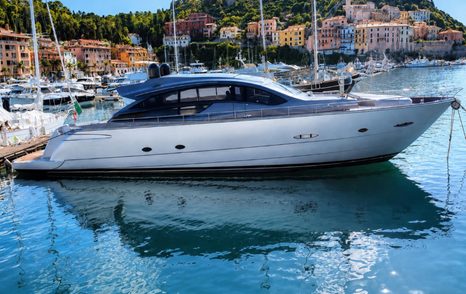 Pershing motor yacht Kioni at anchor side view 