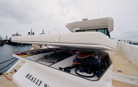Delta-Powerboats-72-Review-tender-garage-half-open