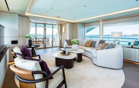Moonen motor yacht Midnight Saga main saloon with doors to aft deck 