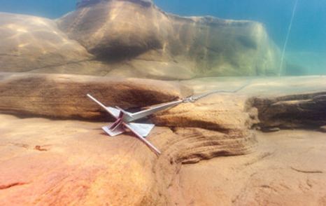 anchor caught under rock