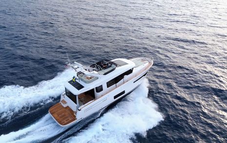 Nimbus-495-Flybridge-Review-at-sea-drone-splash