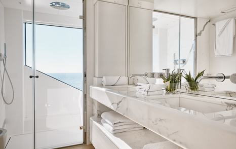 The twin sinks within the owner's suite are made of marble