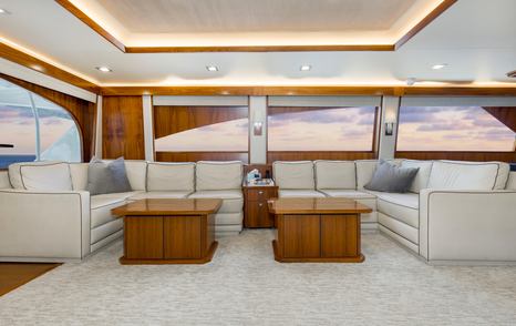 Viking 92EB Sportsfisher yacht Touche saloon with dual white L-shaped leather sofas 