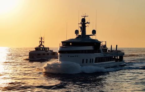 Damen-Xplorer-60-Review-with-support-vessel-sunset