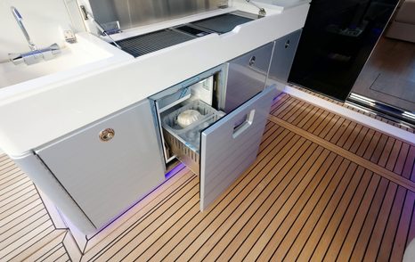 Riviera 5600 Sport Platinum Edition cockpit wet bar with refrigerator drawer