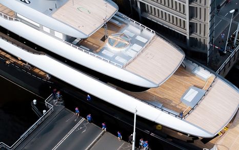 Close up of Feadship Superyacht Thalassa (Project 826) aft decks with jacuzzi and pale teak wood