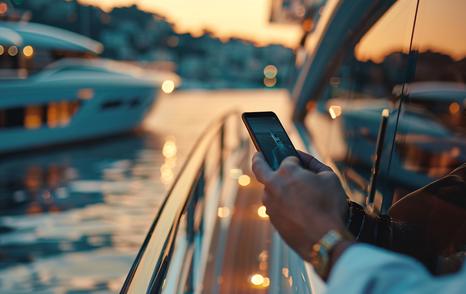 Yacht owner checking yacht in social media