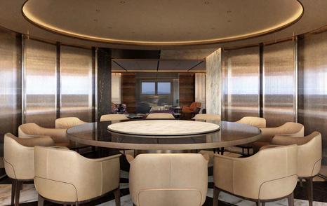 Circular dining table onboard superyacht RAJA²