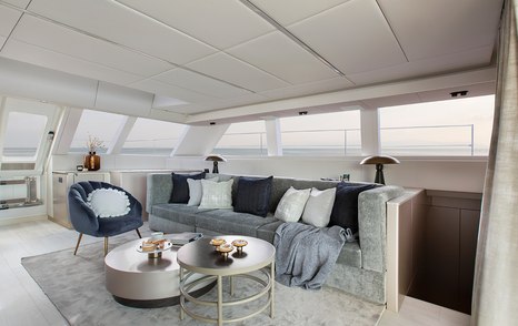 Sunreef Yachts 60 Sunreef Power catamaran main salon seating area with grey furniture