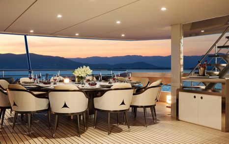 Rendering of Superyacht Project Orion's aft deck circular dining table