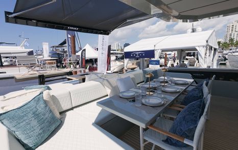 De Antonio D60 cockpit dining setup with open connection to aft deck