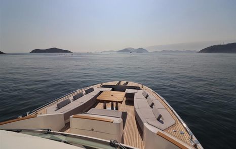 foredeck on yacht from mcy 86 series, with lounging area and sea surrounding