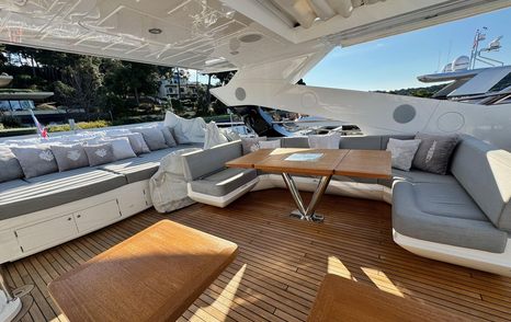 Motor Yacht Halwa's aft seating area and sunpads 