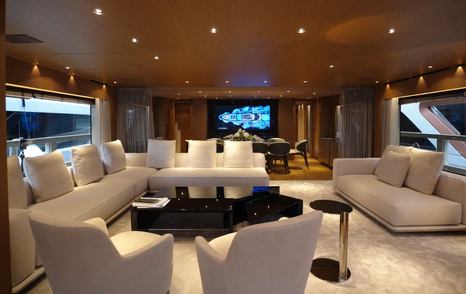 Superyacht Rilassata main saloon with cream L-shaped sofa 