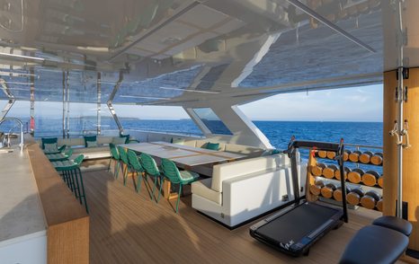  Sundeck with table and gym on Rosetti superyacht EMOCEAN