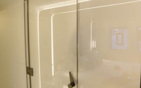 Sunreef Ultima 88 owner’s bathroom with opaque privacy glass activated