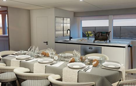 The dining arrangement onboard the Two Oceans 870 Power Catamaran is informal and functional