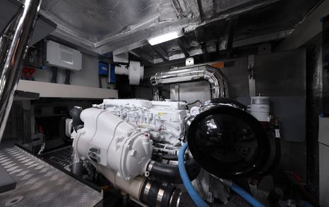 Sirena 48 engine room showing service access around Cummins diesel