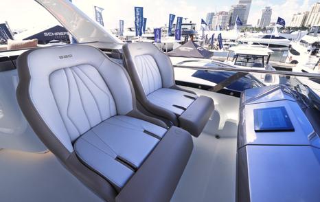 Galeon 520 Fly flybridge helm seating with twin adjustable chairs and forward-facing layout