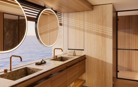 Benetti Oasis 42M ensuite owner's bathroom with twin basins and circular mirrors 