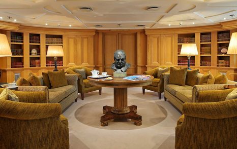 Superyacht Christina O sir Winston Churchill lounge with brown seating