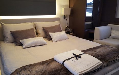 Double bed in cabin on Prestige yacht