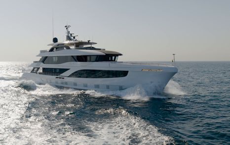 Gulf Craft Majesty 145 underway showing the starboard profile and composite superyacht design