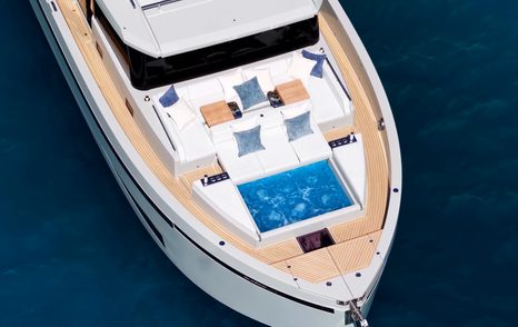 Aerial view of De Antonio D60 foredeck layout with jacuzzi and wraparound seating