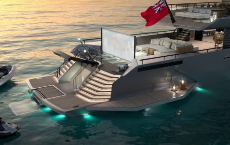 Rendering of superyacht Spitfire stern and beach club at night with outdoor cinema