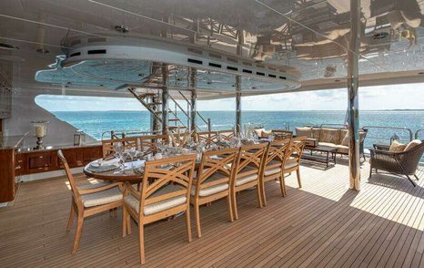 Superyacht Silver Lining's aft dining table 