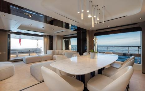 Motor yacht Dambar main saloon dining area