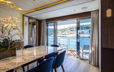 Superyacht Delta One's main saloon dining area balcony