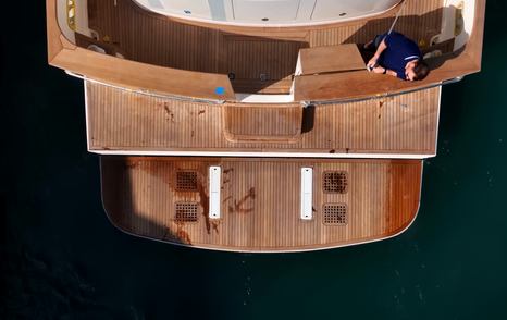 Fleming 85 teak swim platform and transom viewed from directly overhead