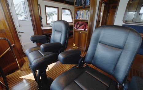 Nordhavn 75 EYF wheelhouse helm seats with excellent all-round visibility and watchkeeping layout