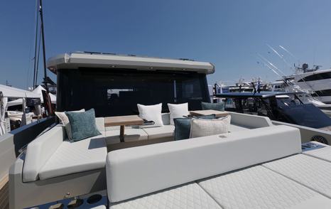 De Antonio D60 foredeck lounge with wraparound seating and forward sun pad