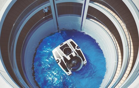 Moon pool onboard Feadship Project Escape, with personal submarine in centre