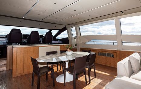 Pershing 108 superyacht Grace salon dining area 