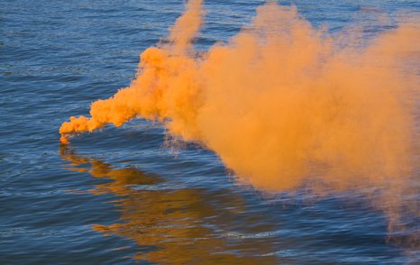 Marine Distress Flares: orange smoke flare - essential safety equipment