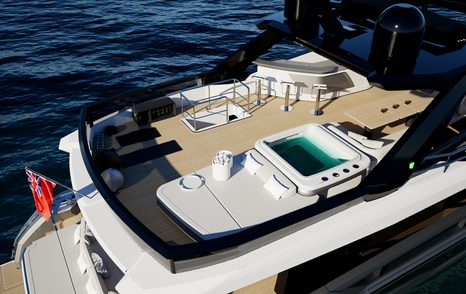 Pearl 100 Hybrid motor yacht flybridge with shaded bar area and jacuzzi next to grey sunpads 